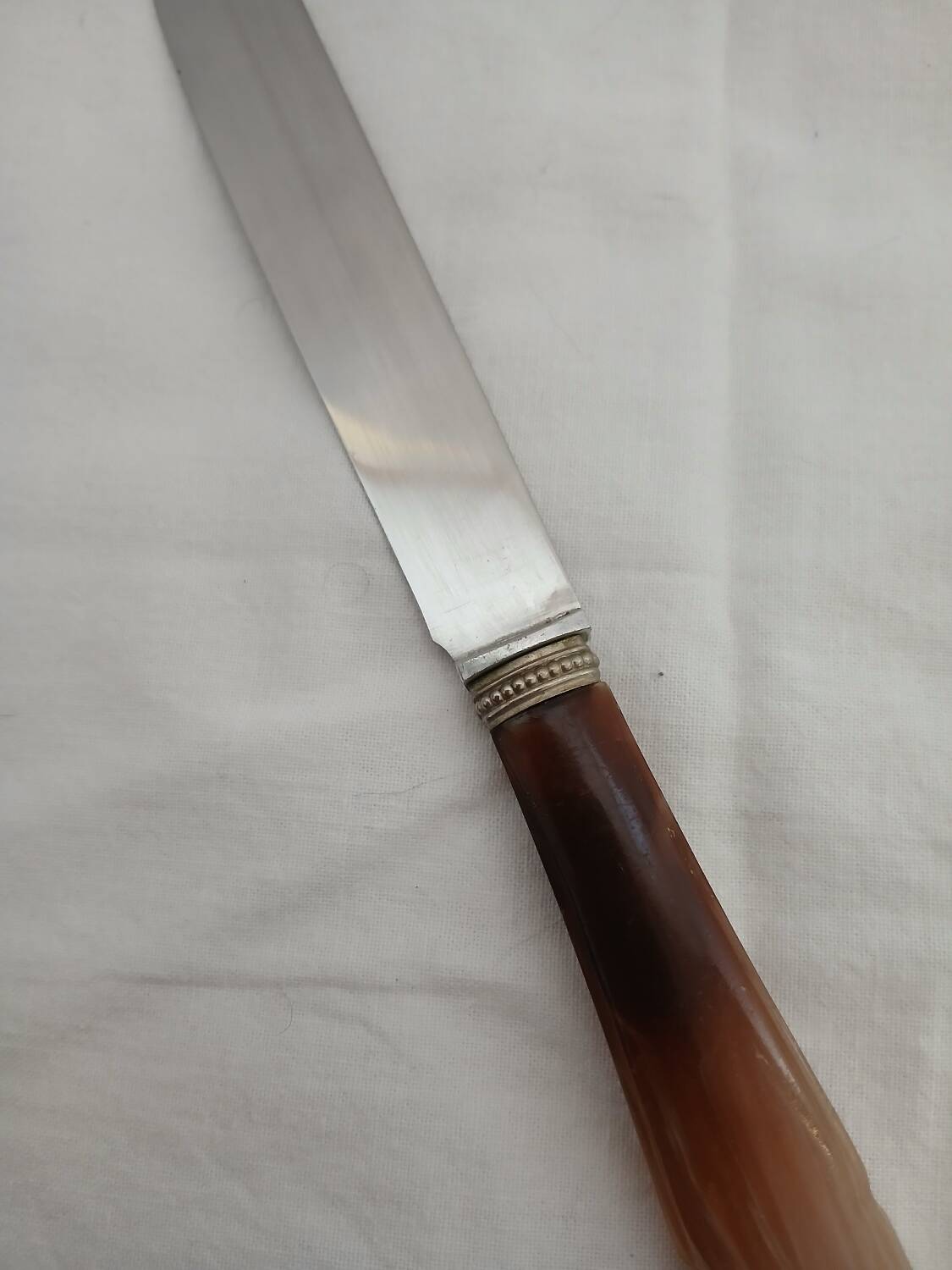 12 couteaux anciens en bakélite + inox