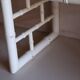Pair of bedside tables in bamboo effect wood and woven wicker