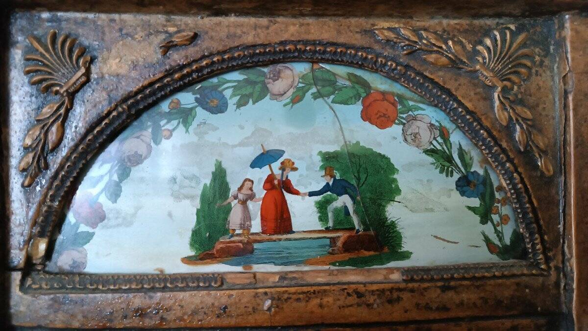 Small antique Empire mirror in gilded wood painted on glass