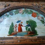 Small antique Empire mirror in gilded wood painted on glass