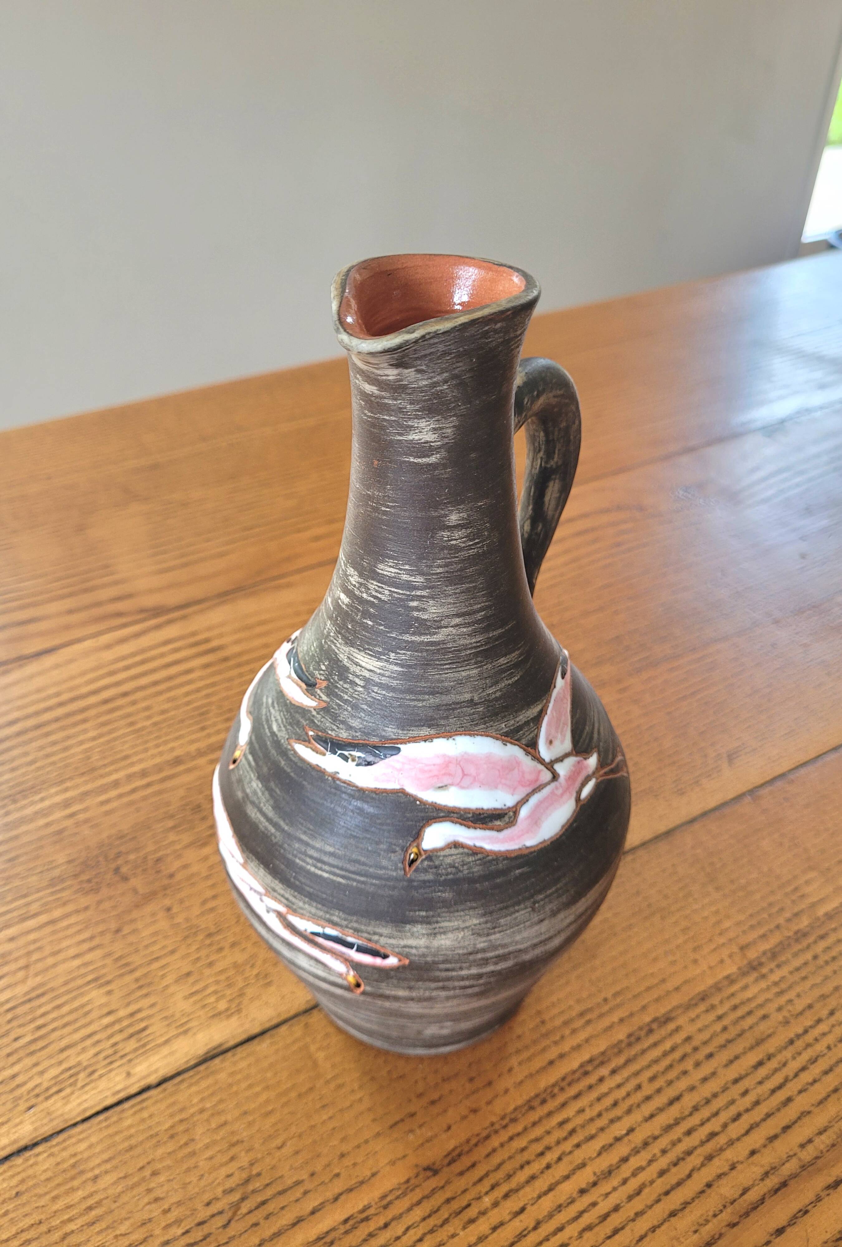 Rare signed ceramic and enameled porcelain pitcher