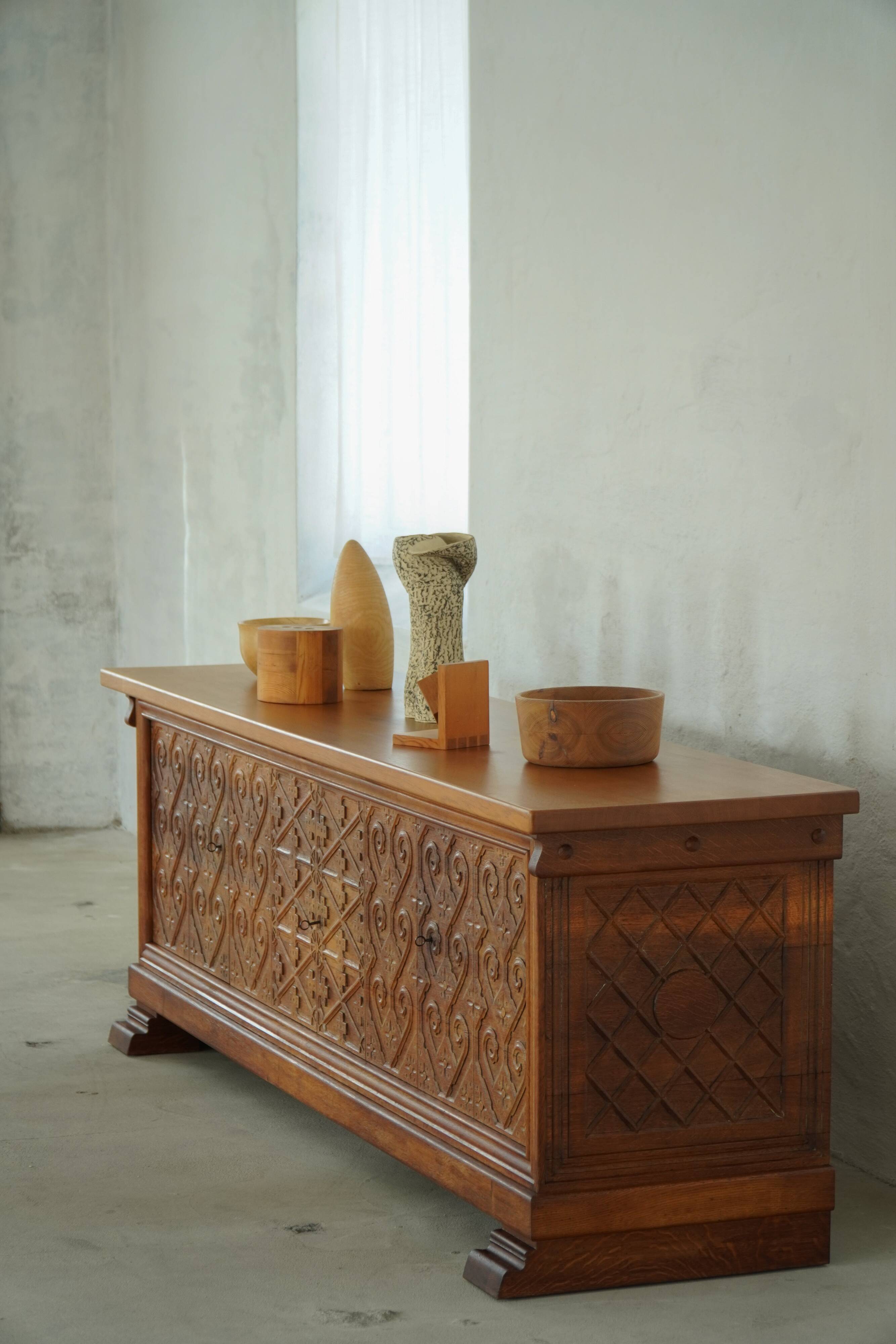 Modern Danish buffet in carved oak, signed Max A. Rasmussen, Denmark, 1940s.