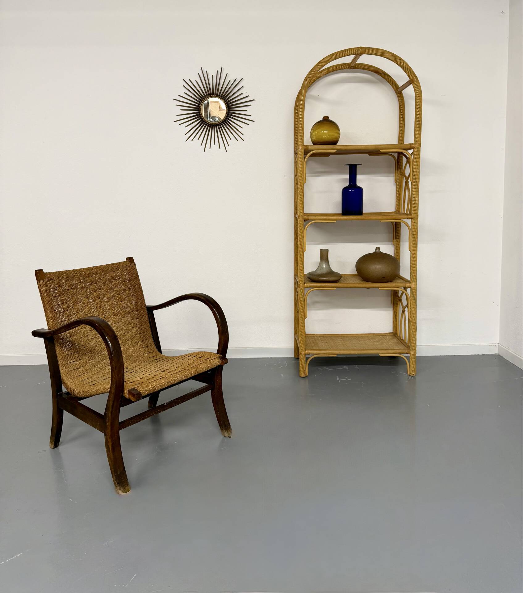 Large woven rattan bookshelf designed in the 1970s.