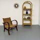 Large woven rattan bookshelf designed in the 1970s.