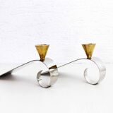 Pair of chromed metal and brass candlesticks