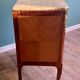 Small Louis XV-style chest of drawers  in veneer and bronze