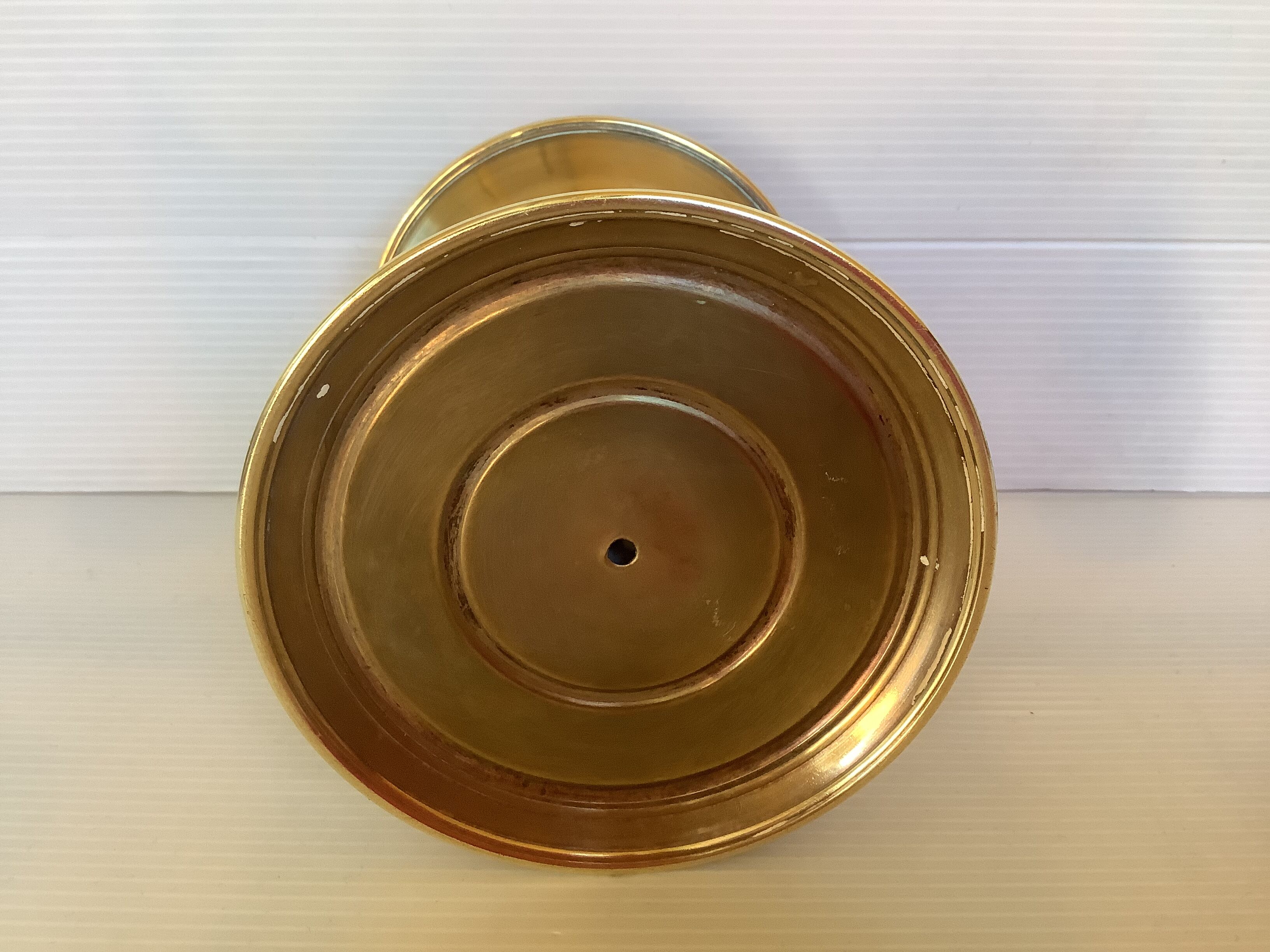 Old brass candle pique