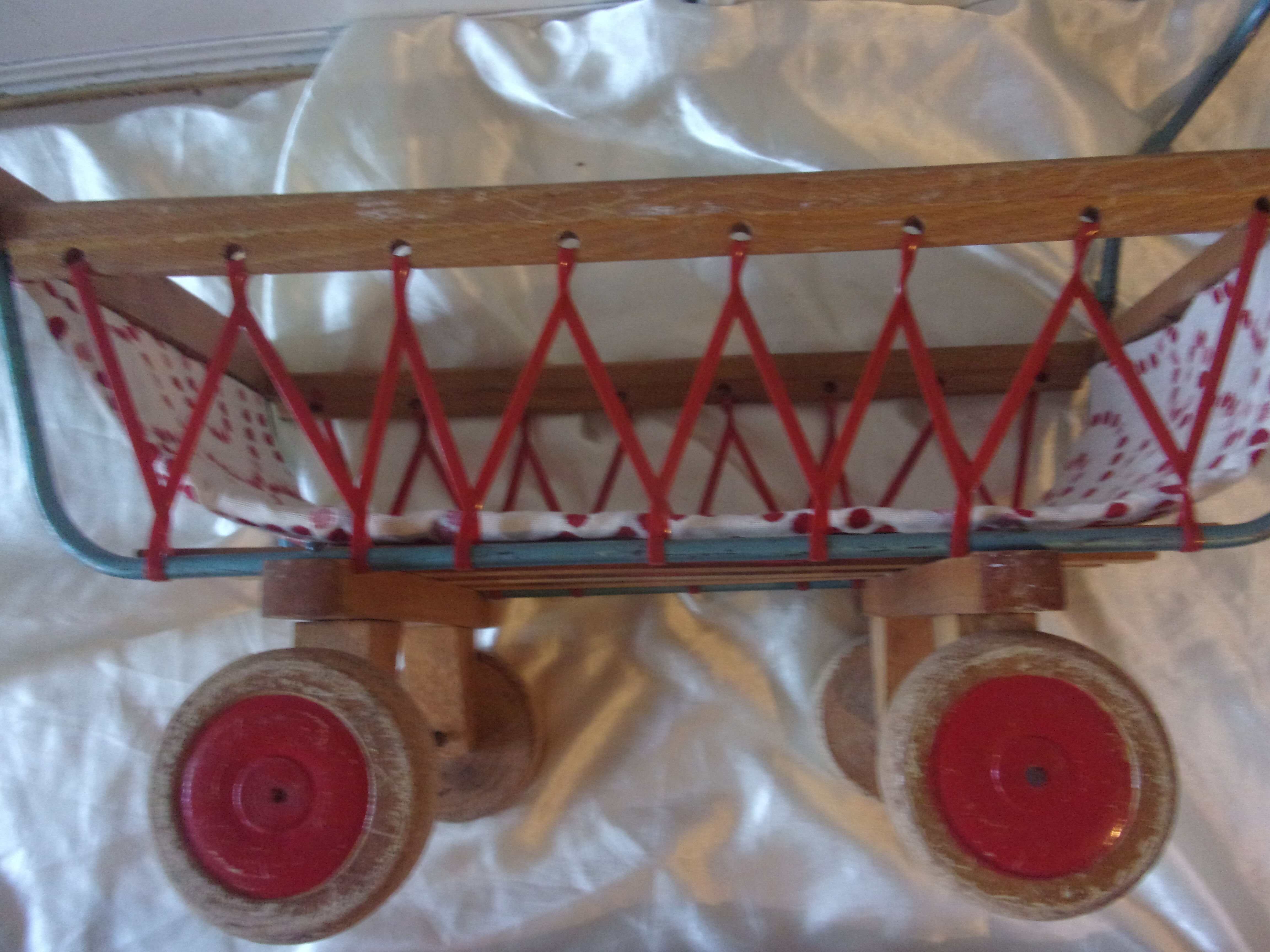 Old wooden and metal doll pram - year 60