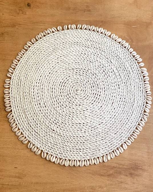 Large woven vegetable fiber placemat decorated with shells cowrie shells Bali
