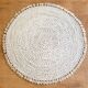 Large woven vegetable fiber placemat decorated with shells cowrie shells Bali