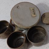 Teapot and its small bowls