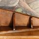 Small brutalist corner shelf in solid oak.