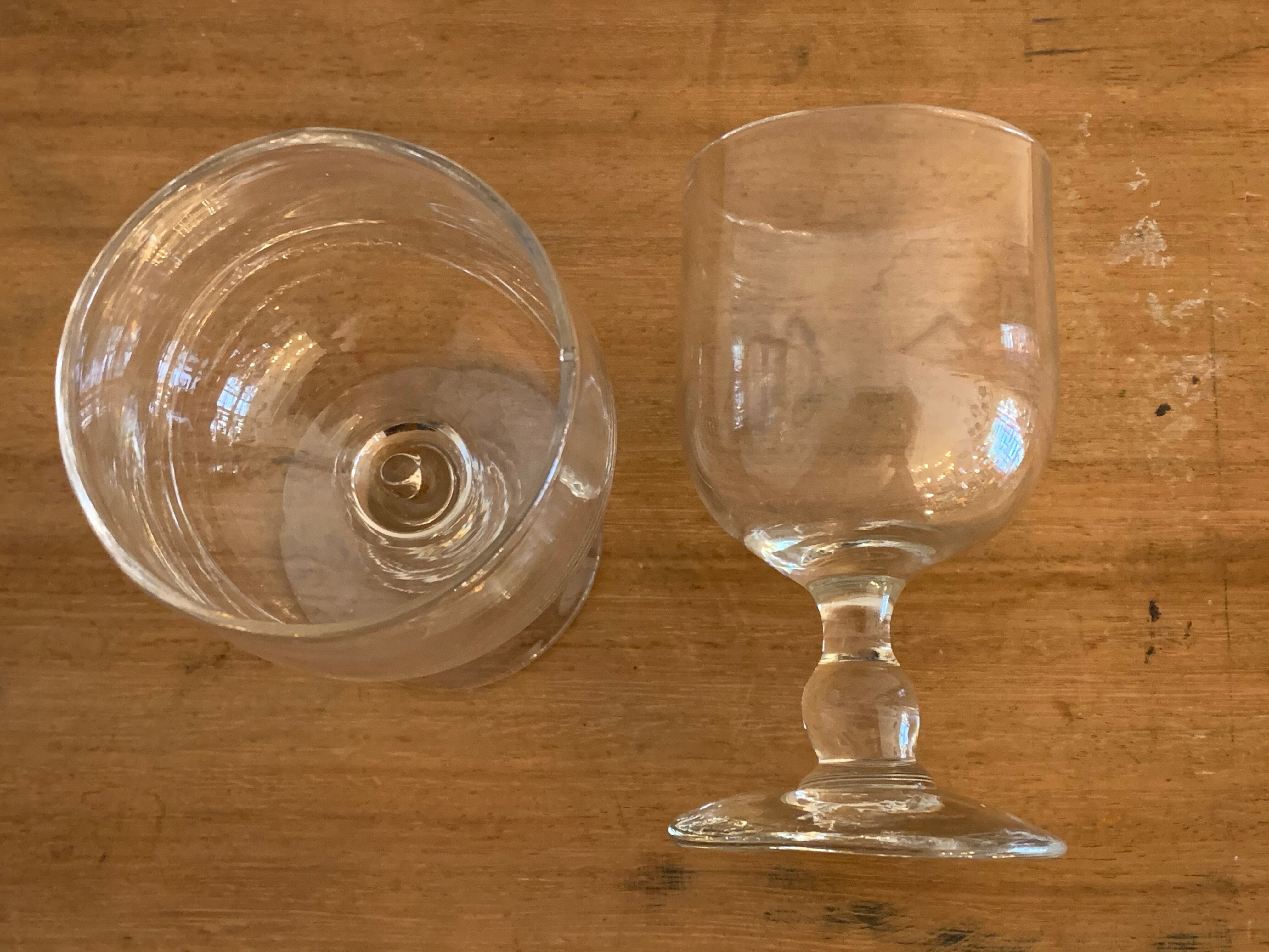 8 old red wine glasses with blown and bubbled glass walk