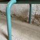 Vintage wood kindergarten bench and tubular structure in long