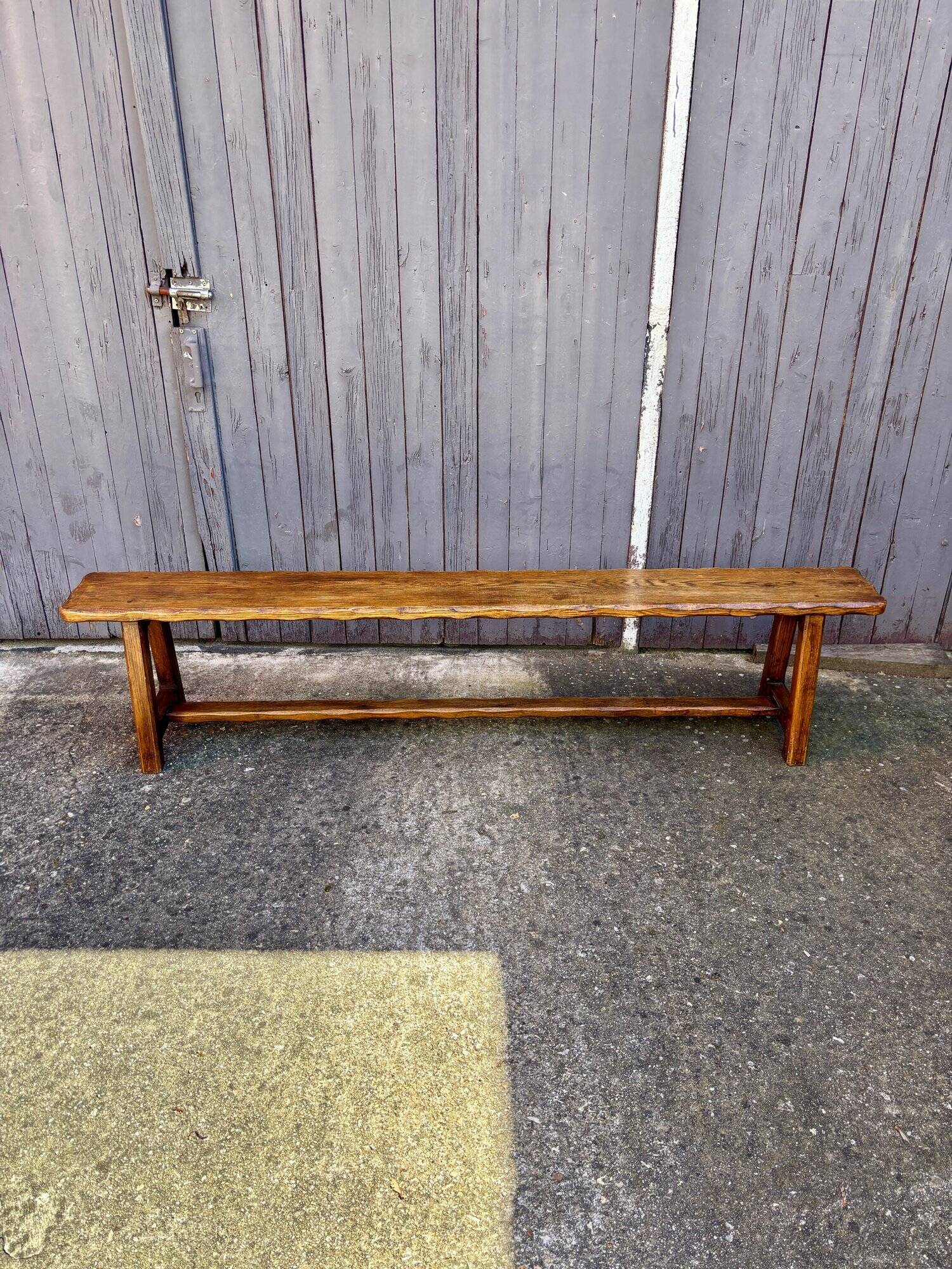 Brutalist bench in dark wood