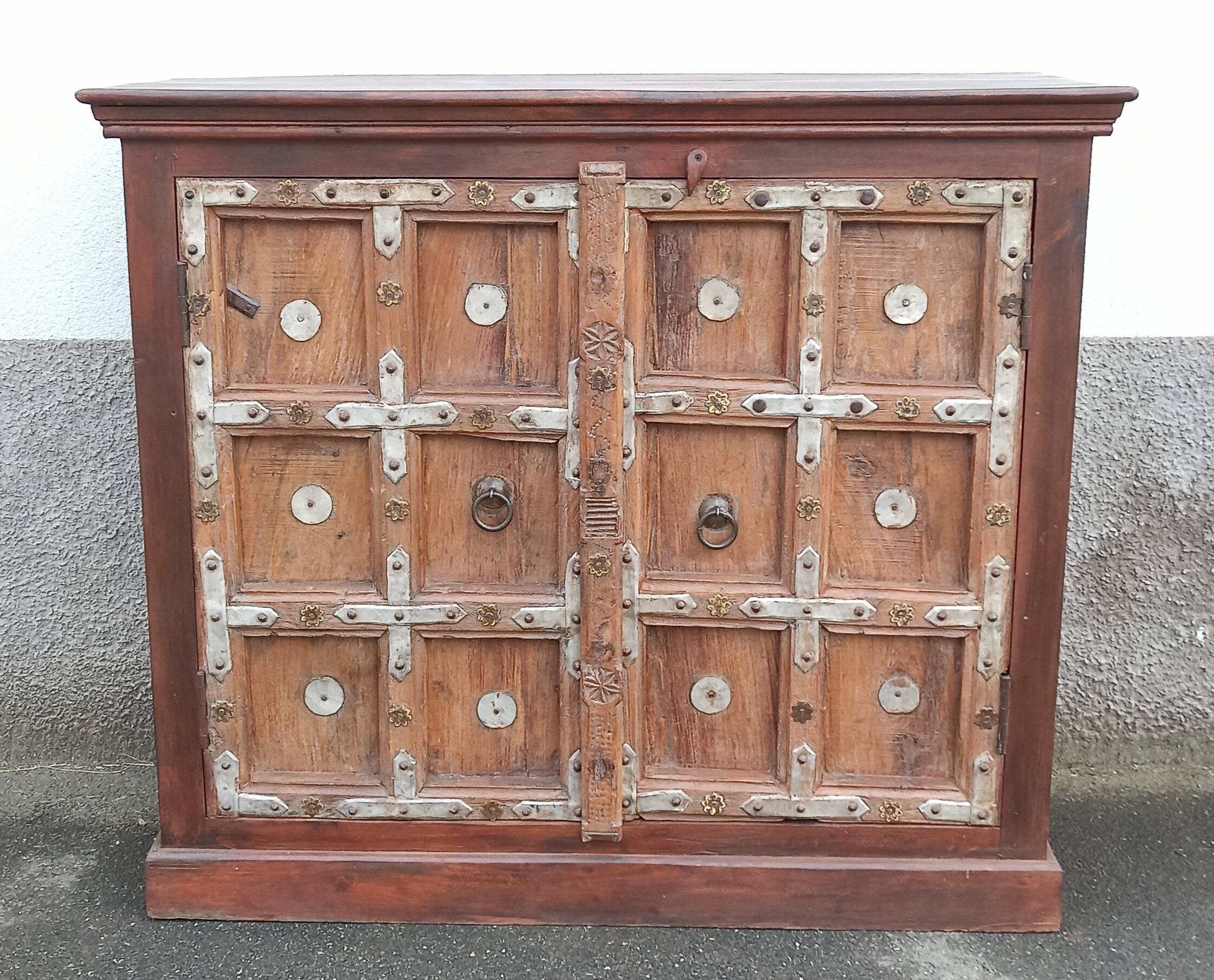 Small old wooden sideboard with two doors