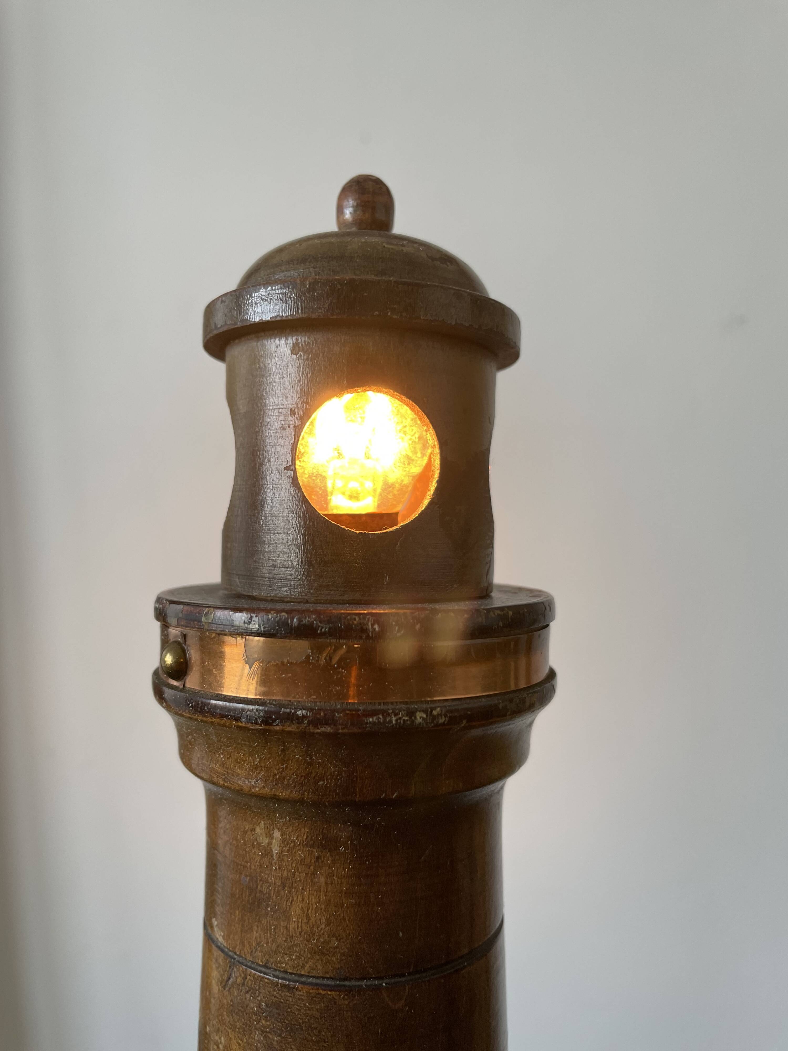 Souvenir lighthouse lamp from Calais in wood
