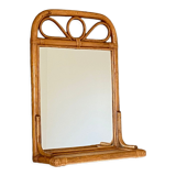 Arched rattan mirror with shelf. 1960.