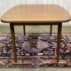 G-Plan teak table from the 1970s with butterfly extension.