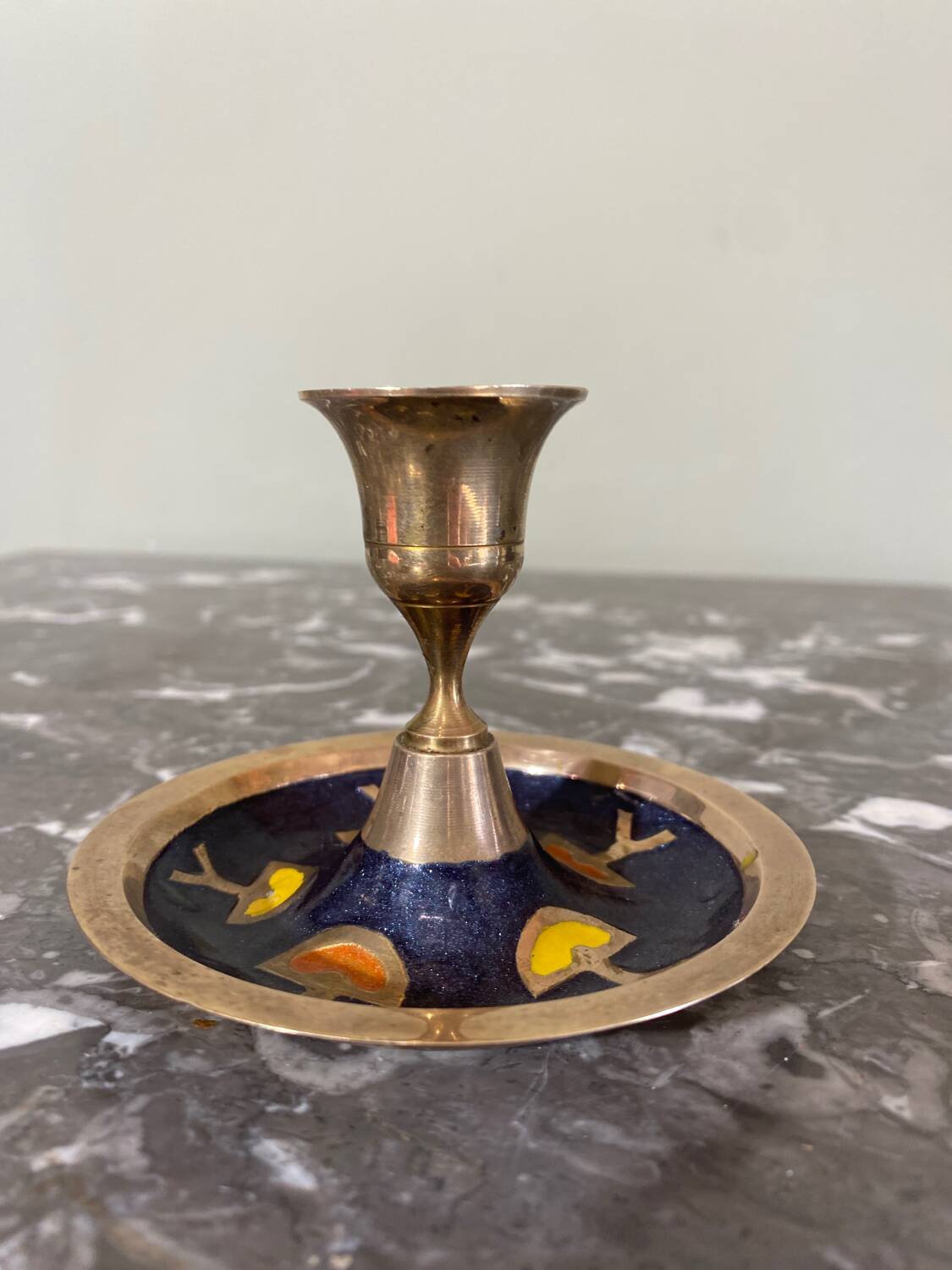 Enameled brass candle holder