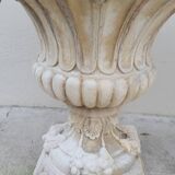Pair of planter vases decorated with faces in reconstituted stone 1950s