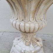 Pair of planter vases decorated with faces in reconstituted stone 1950s