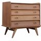 Renovated vintage commode from the 1960s in oak with slanted profile and tapered legs.