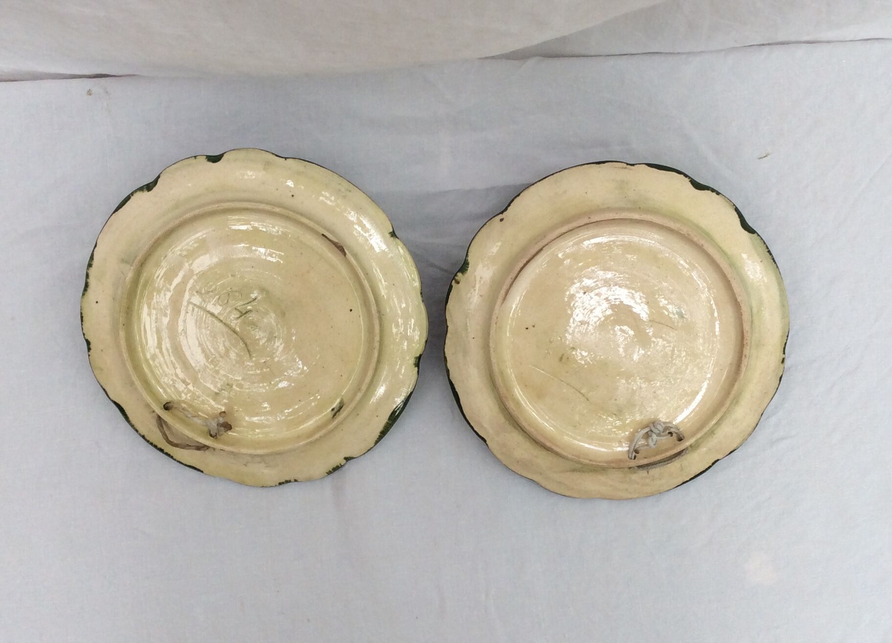 Pair old earthenware plates numbered dimension: diameter -6cm- height -6cm-