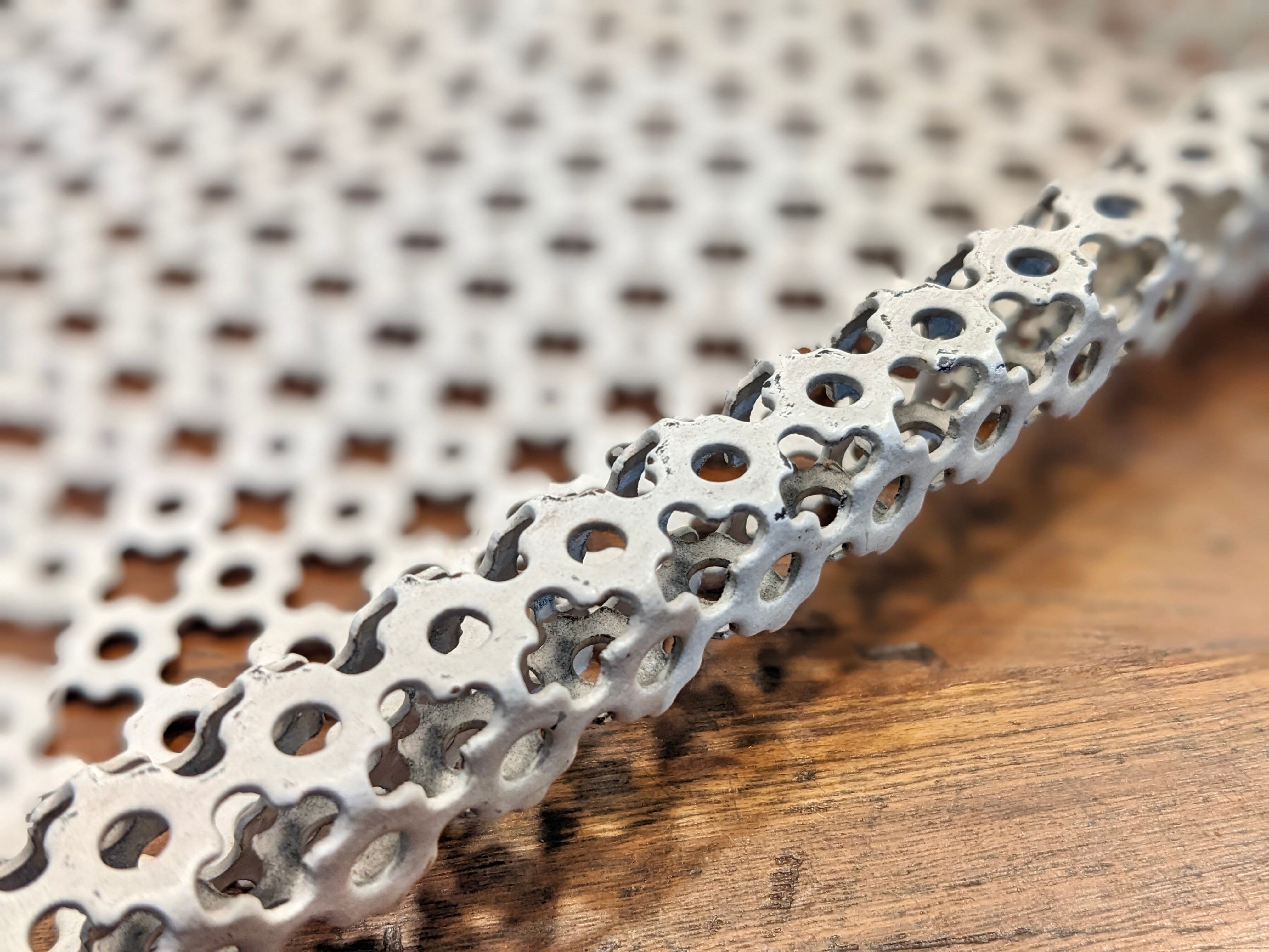 Top in white lacquered metal mathieu mategot