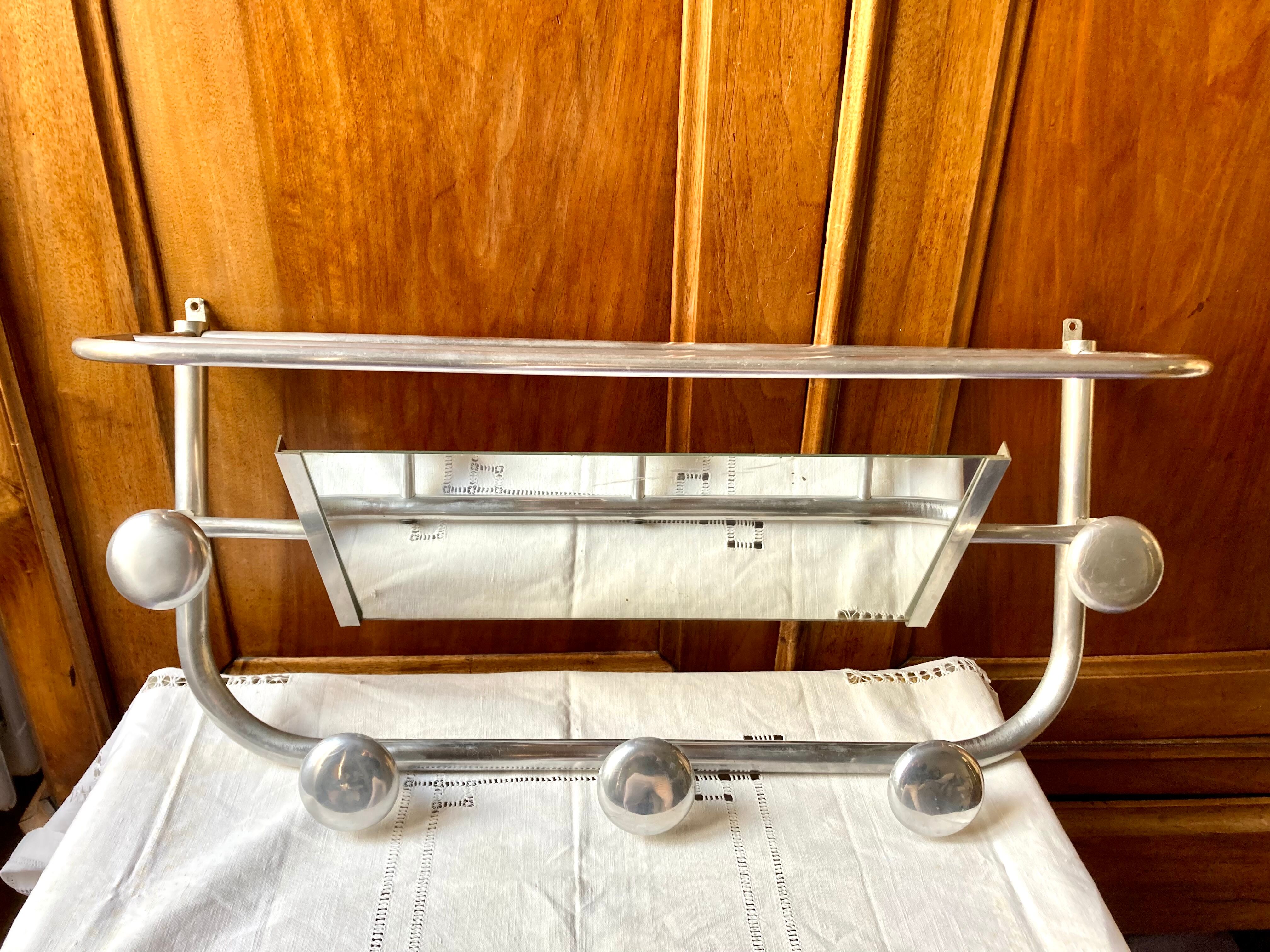 Vintage aluminum wall coat rack with mirror