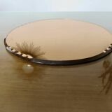 Round beveled amber pink mirror