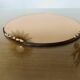 Round beveled amber pink mirror