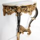 Console Napoléon III du XIXe siècle en bois ébonisé et bois doré