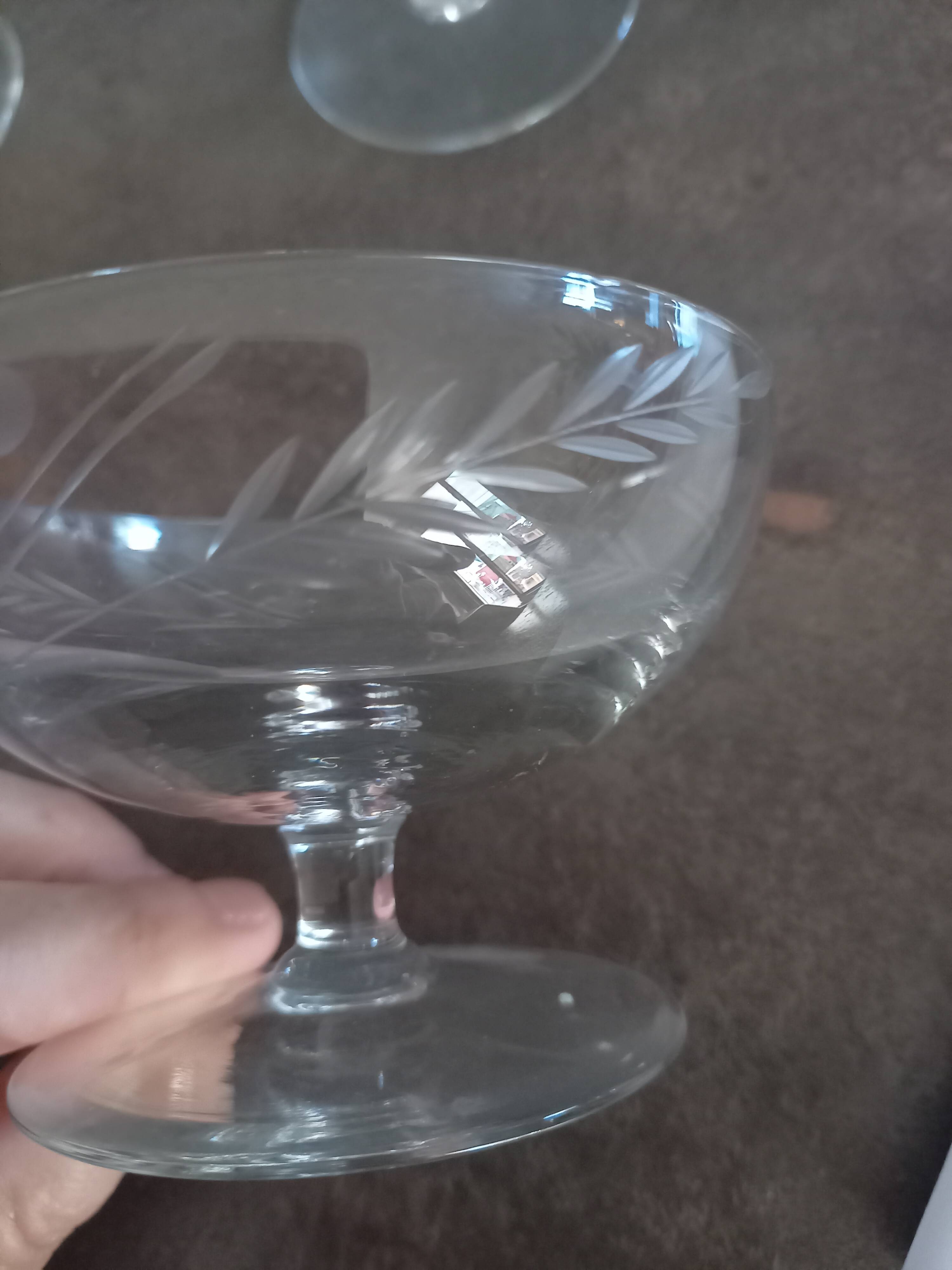 12 crystal champagne glasses engraved with a wheat stalk motif