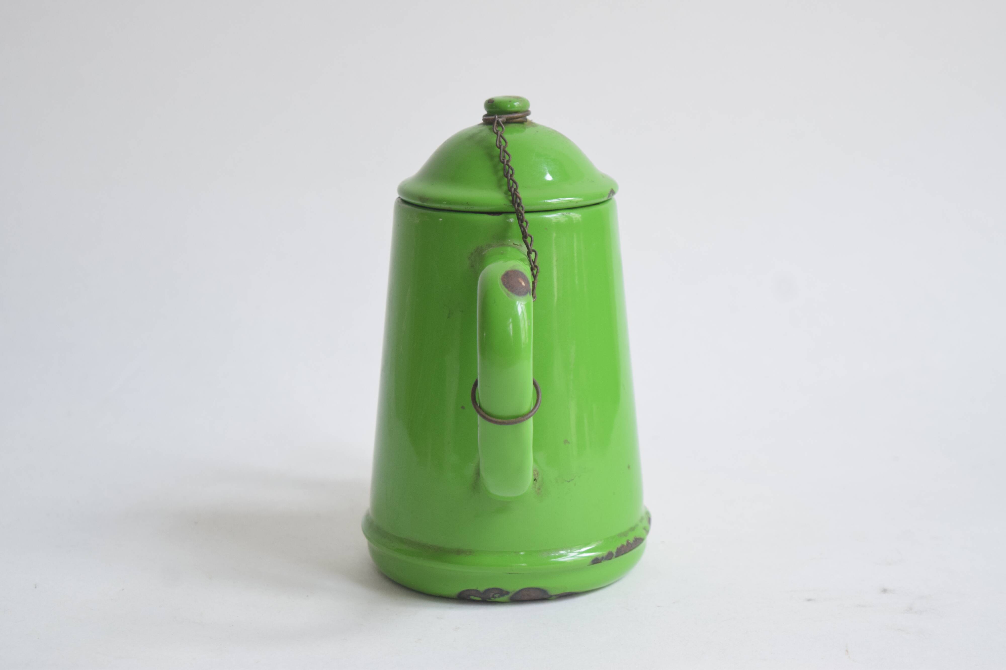 Small vintage green coffee maker in enameled sheet metal