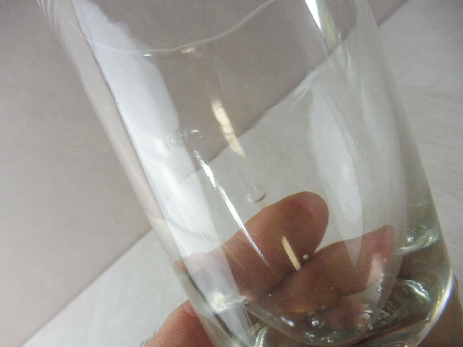 Old wormwood glass in molded glass, in thick glass