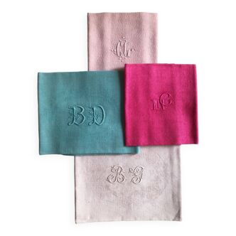 Suite of four antique tinted napkins