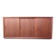 Low sideboard with 3 sliding doors in teak. Denmark 1960