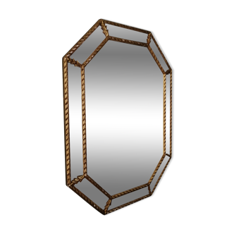 Octagonal golden mirror by ancient parclose