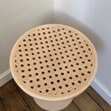 Tam Tam Stamp stool Made in France with a woven rattan-style seat.