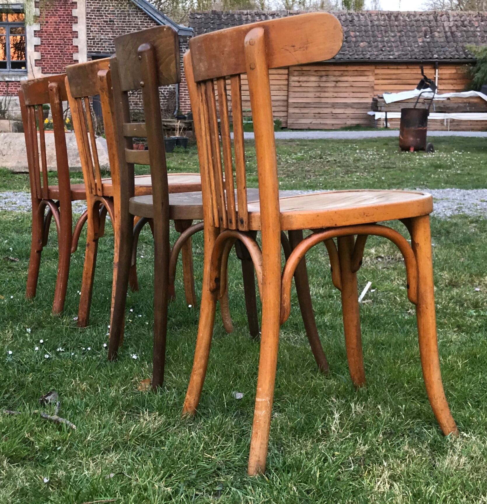 Series of 4 mismatched bistro chairs