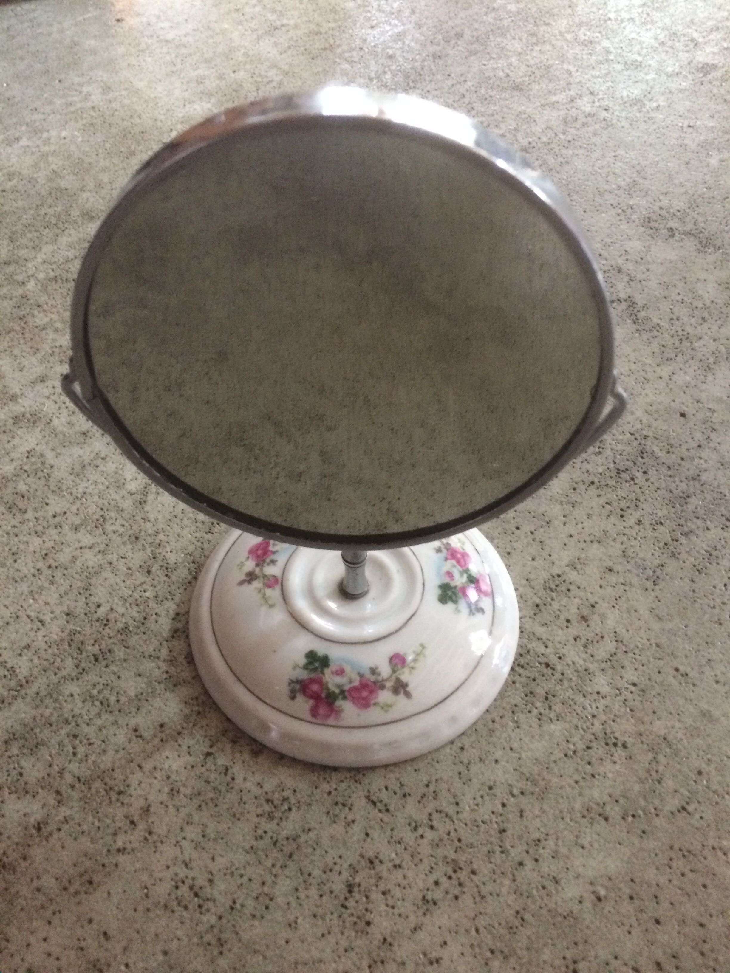 Porcelain swivel mirror