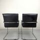 Paire de fauteuils de bureau cuir et structure tubulaire chromé