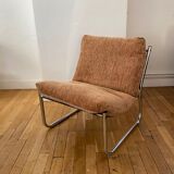 Beige and chrome armchair
