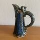 Antique Art Nouveau enamelled stoneware carafe