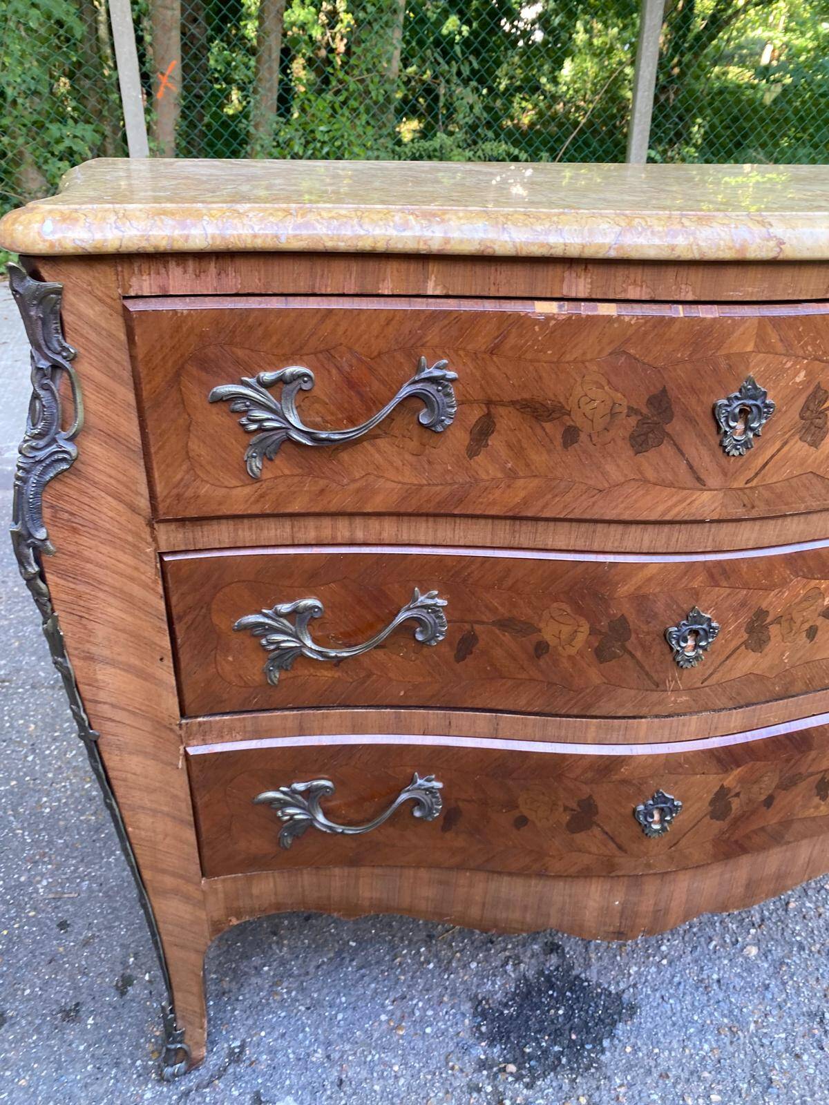 Curved Louis XV chest of drawers in marquetry and beige marble