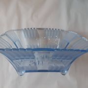 Polished transparent blue glass fruit bowl