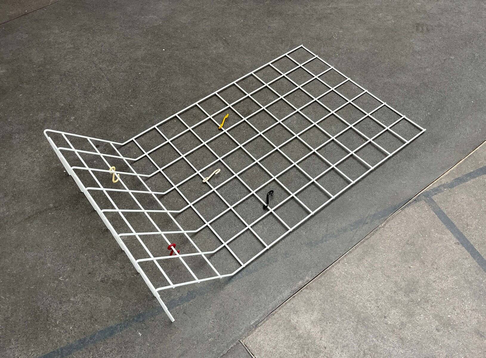 Minimalist white German mid-century coat rack with strings from the 1960s.