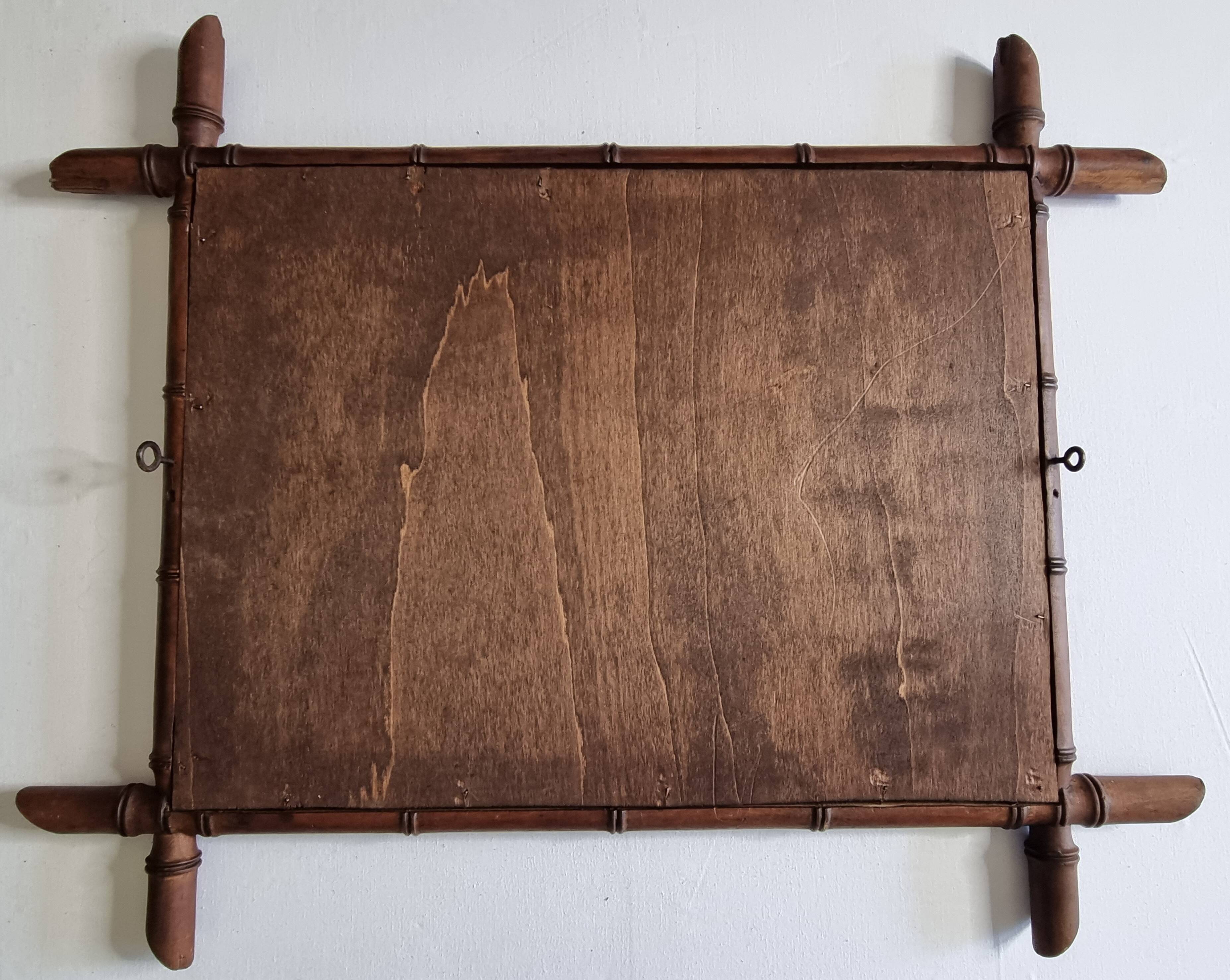 Miroir mural en bois tourné façon bambou, style Napoléon III, XIXe 67x56 cm
