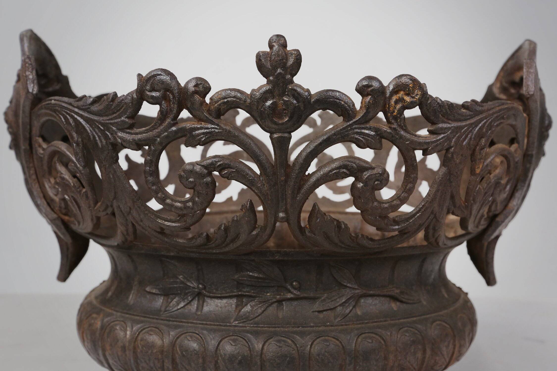Cast Iron planter decorated with masks and lion paws, France 1850s